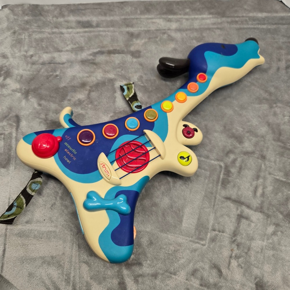 B. Toys Woofer‎ Hound Dog Guitar Musical Toy Blue Electric Acoustic Tested Works